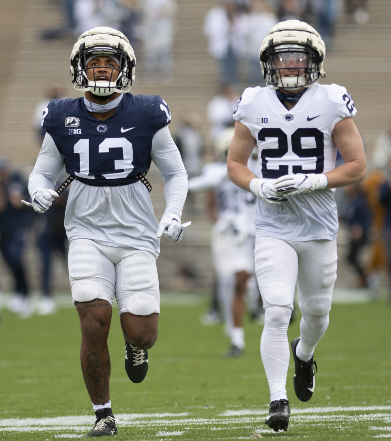 Penn State football spring practice, Brooks (13) and Costantini (29)